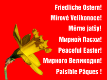 Glockenblume und "Friedliche Ostern!" in verschiedenen Sprachen