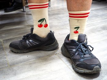 Socken mit roten Kirschen - Symbol der KSČM